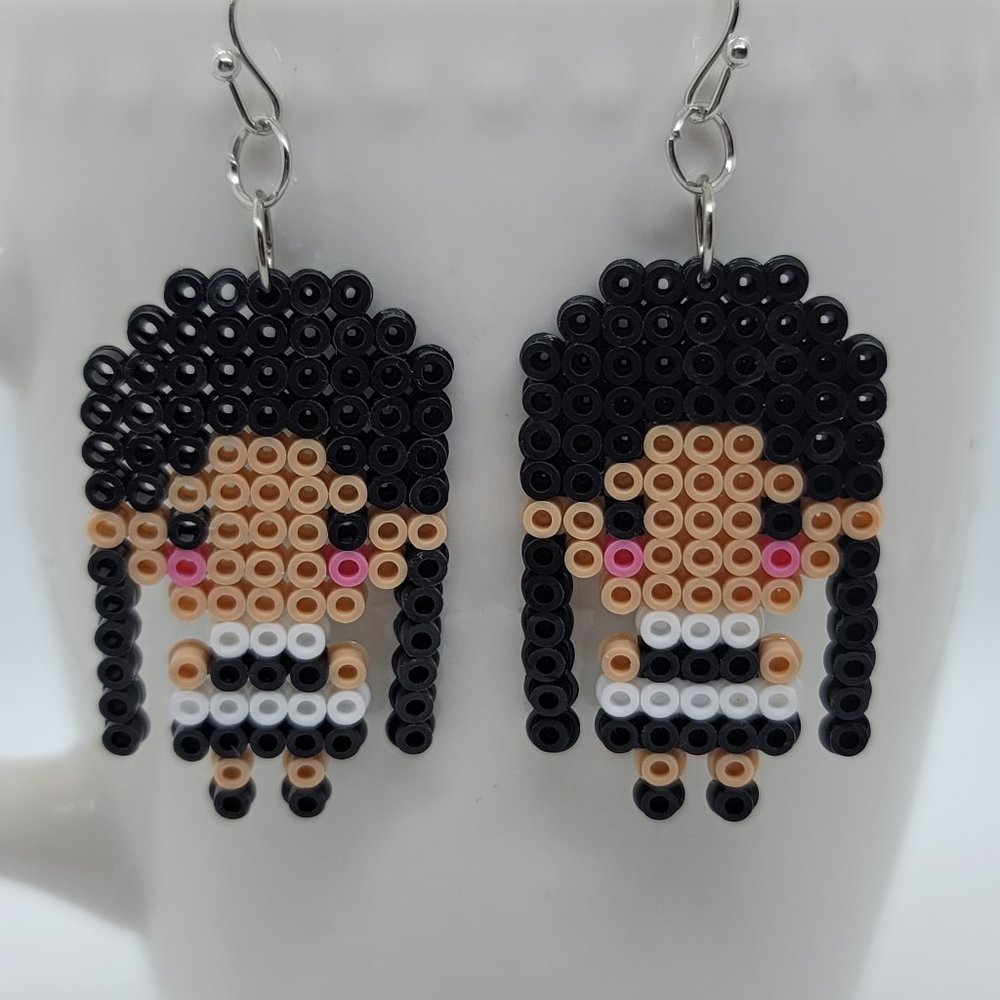 Wednesday earrings with black and white dress